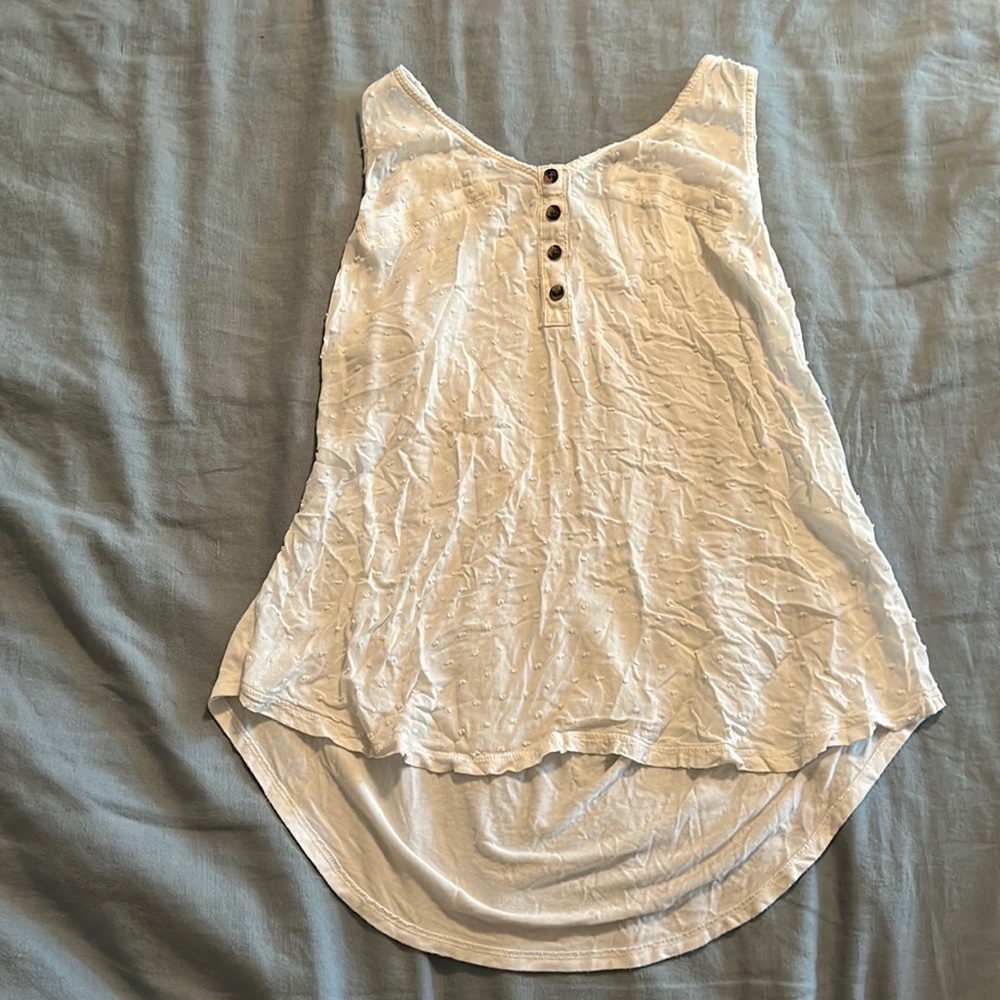 Small sleeveless white shirt